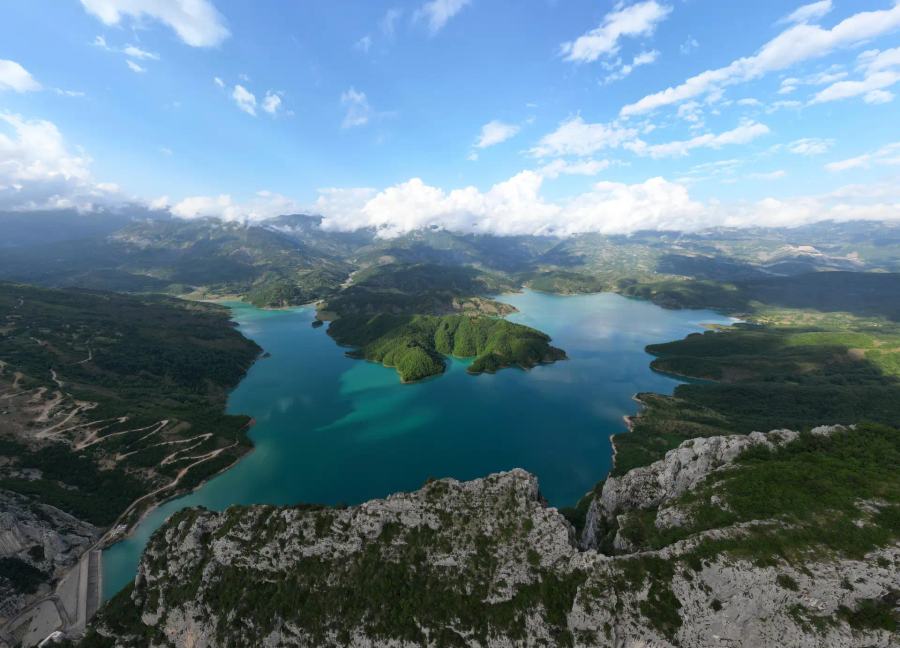 Bovilla Lake with crystal clear waters surrounded by mountains